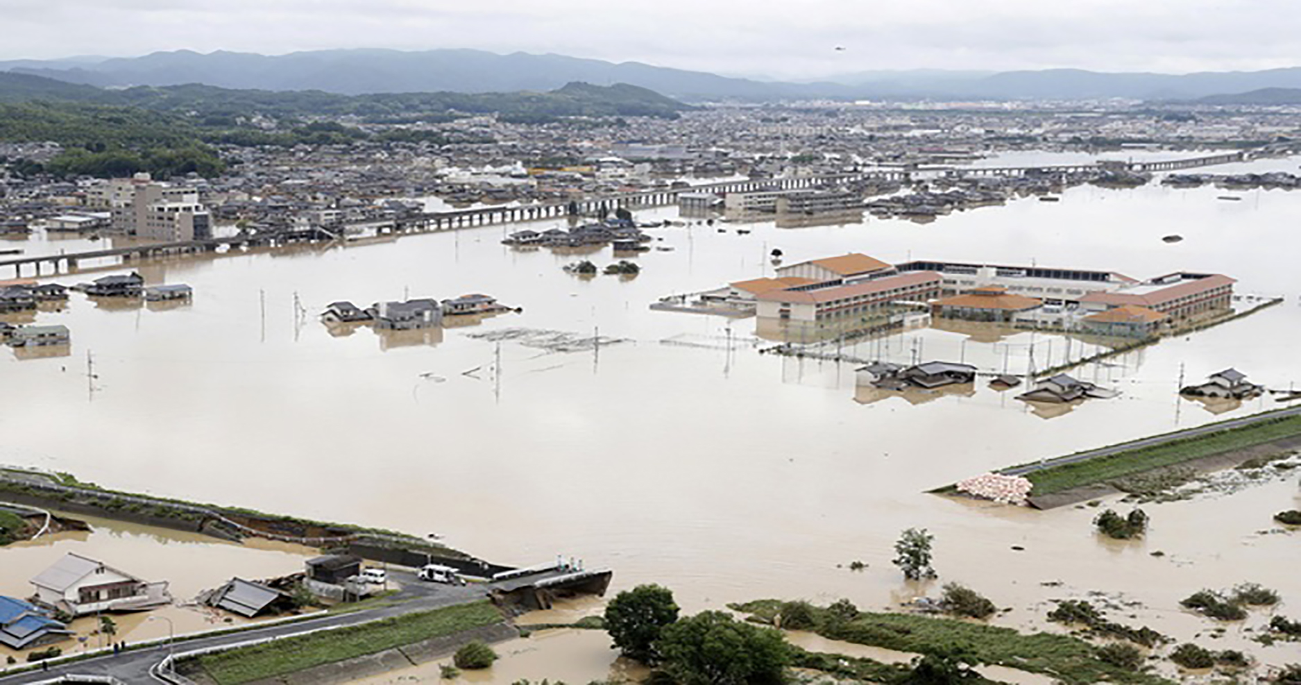 At least 64 killed,dozens missing in Japan after unprecedented rain